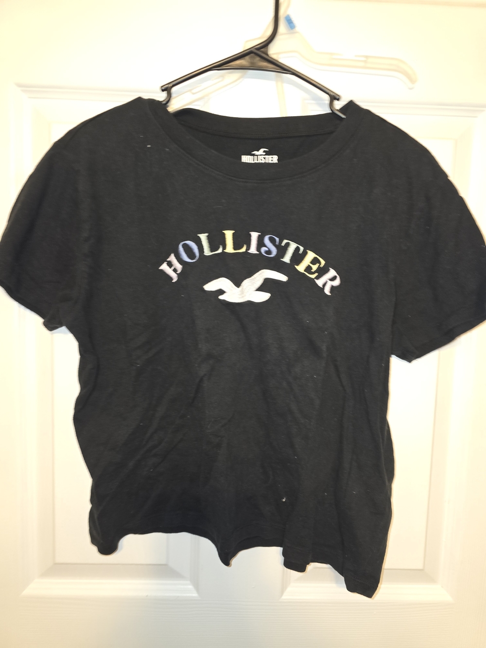 Hollister Black Short Sleeve Tee with Pastel Rainbow Logo